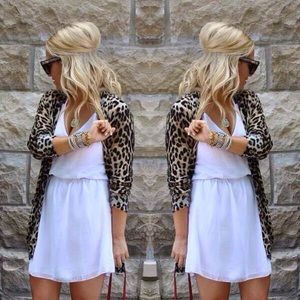 Sleeveless white cinched dress - never worn